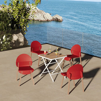 4-piece outdoor chair set with red chairs and a white folding square table on a seaside terrace on Tampa Home & Garden Store