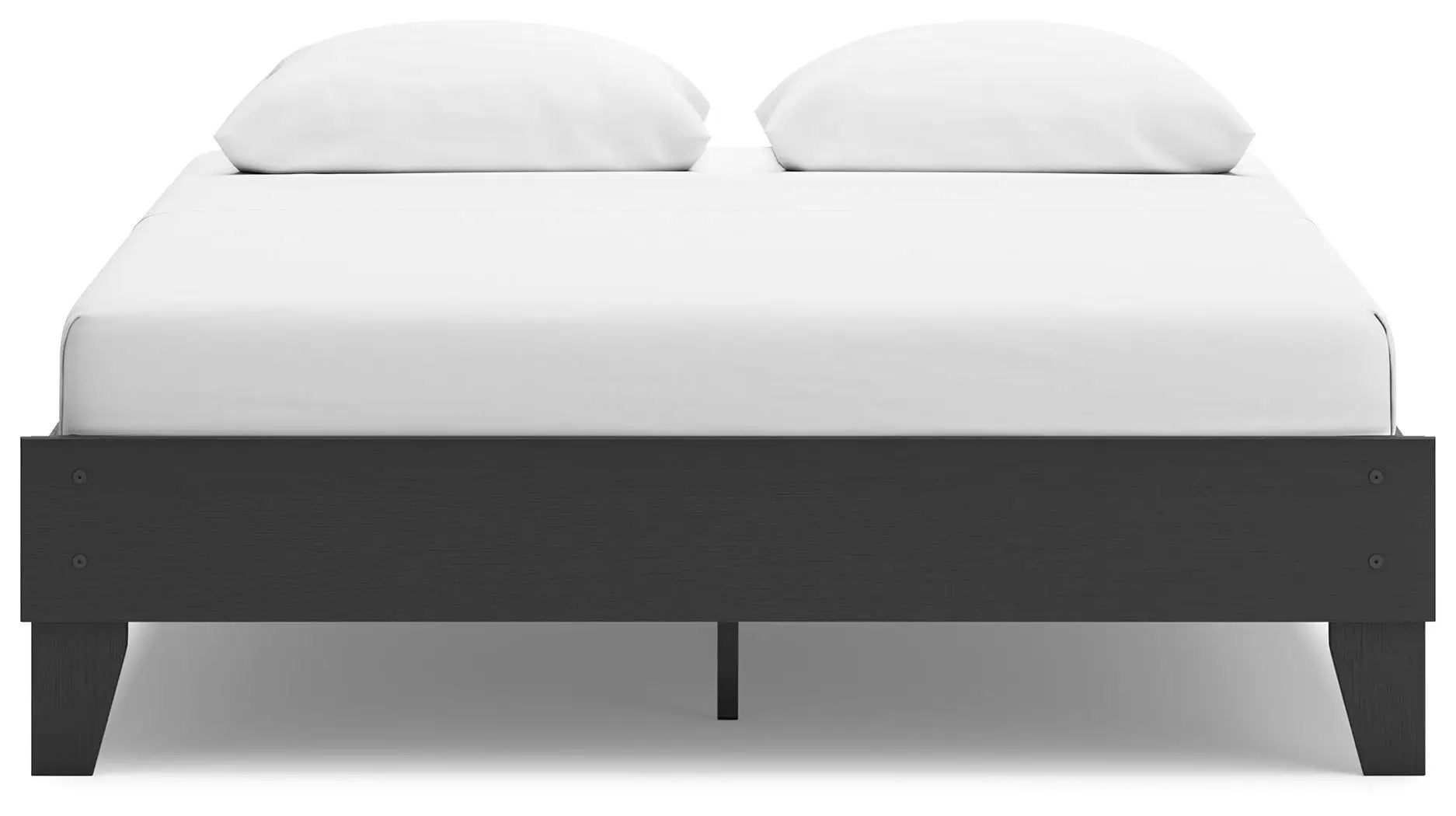 Socalle platform bed in dark wood with white bedding and two pillows on Tampa Home & Garden Store