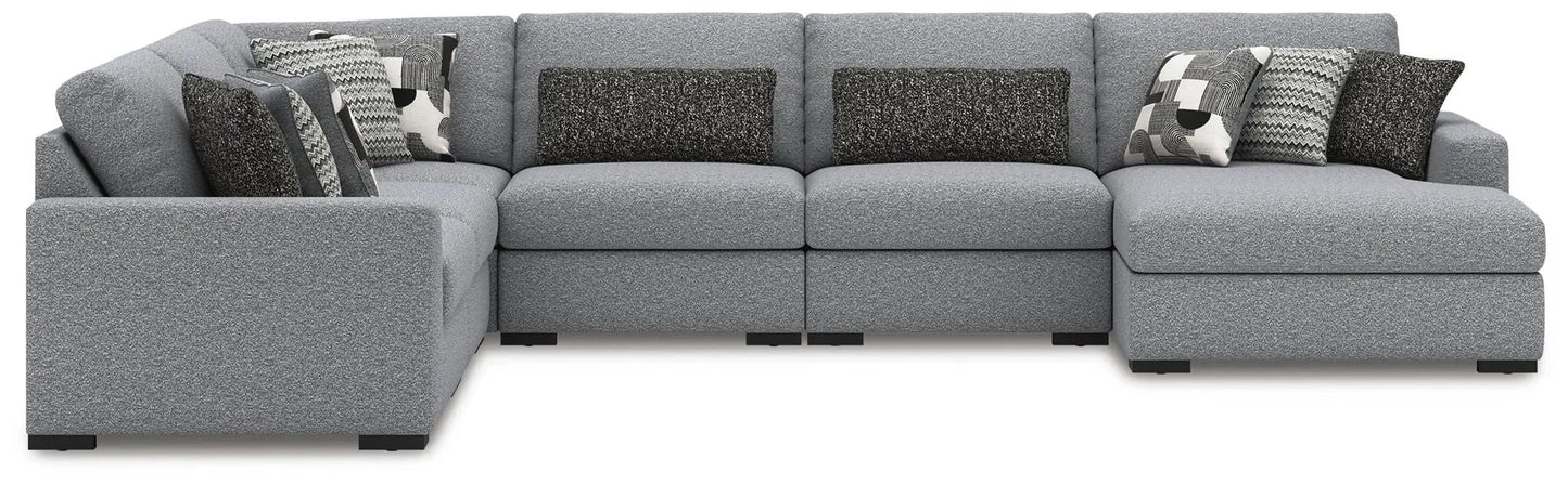 Bealton sectional by Unique Piece Furniture in grey textured fabric with contrast pillows on Tampa Home & Garden Store