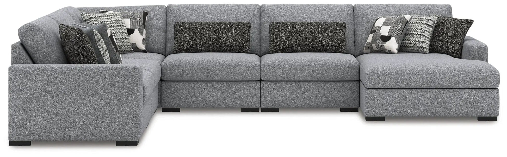 Bealton sectional by Unique Piece Furniture in grey textured fabric with contrast pillows on Tampa Home & Garden Store