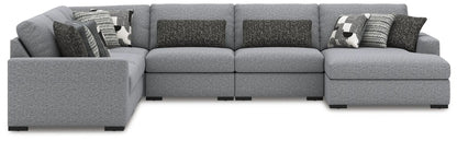 Bealton sectional by Unique Piece Furniture in grey textured fabric with contrast pillows on Tampa Home & Garden Store
