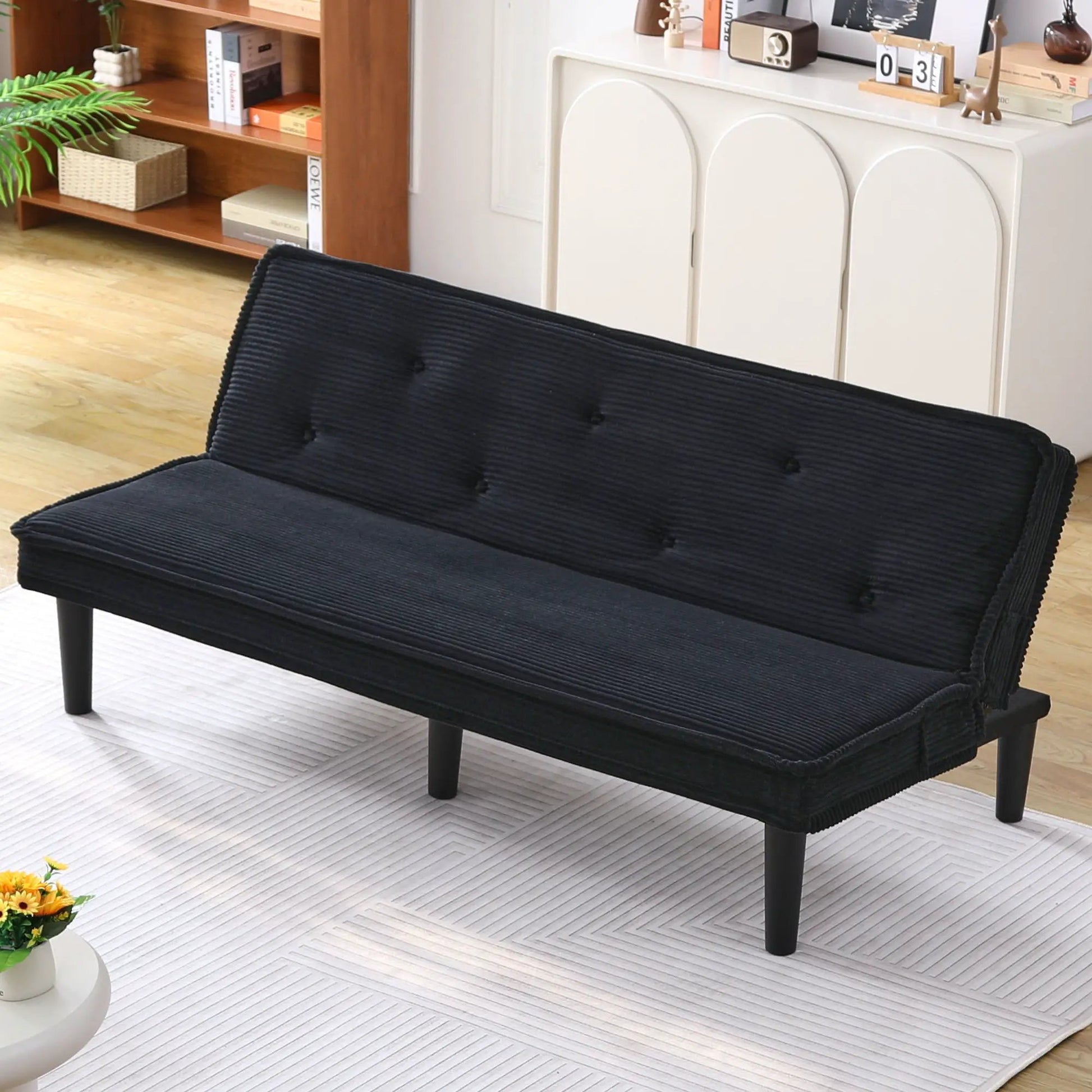 Versatile Sofa Bed With Solid Wood Frame futon in black ribbed upholstery on Tampa Home & Garden Store