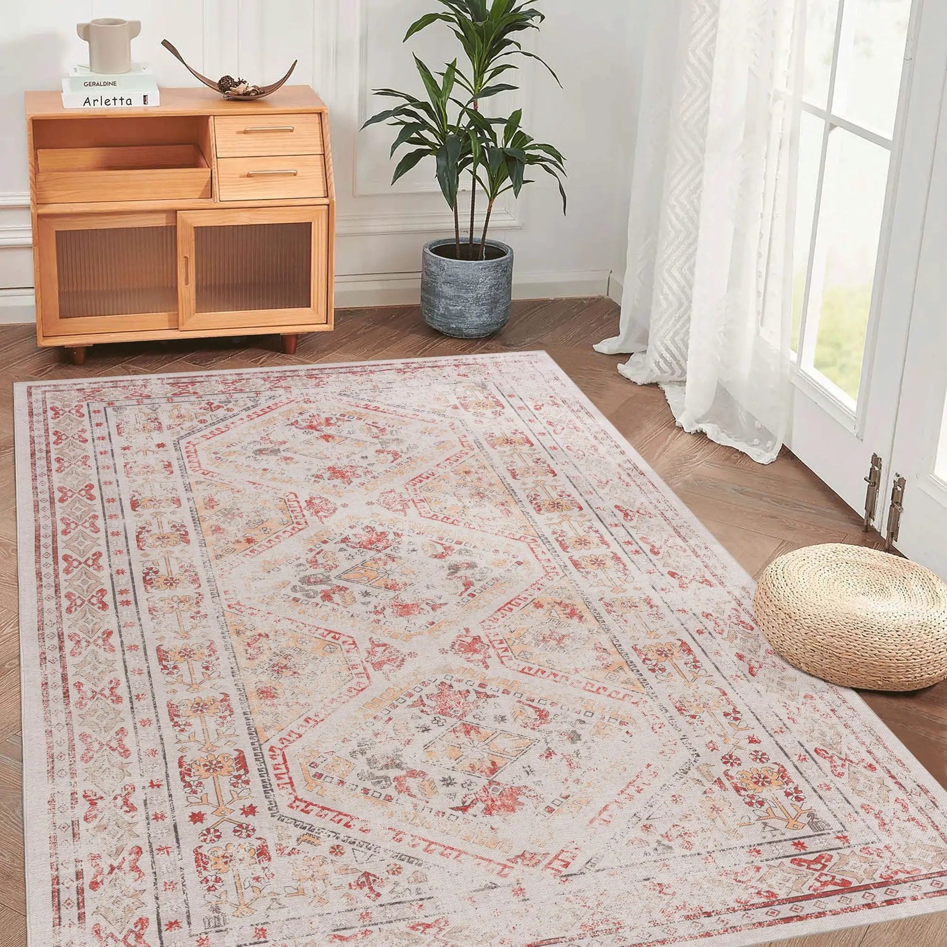 Maval washable rug Unique Piece Furniture in beige with red motifs, laid in living room on Tampa Home & Garden Store
