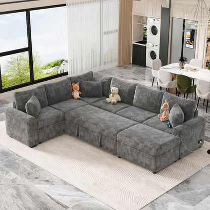 Gray sleeper sectional sofa with storage ottoman and three pillows in a modern living room on Tampa Home & Garden Store