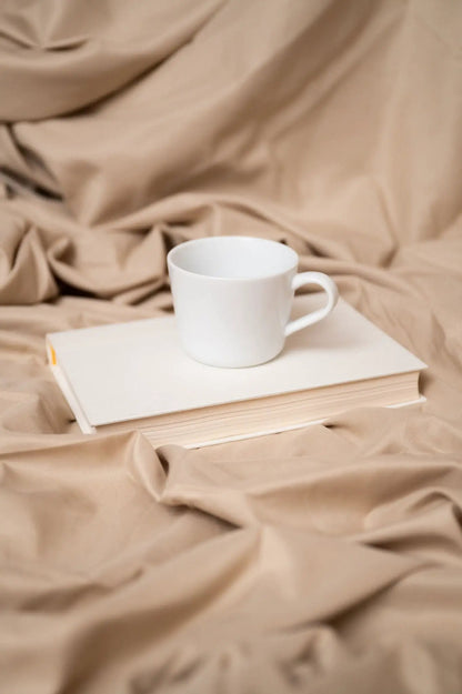 4 Piece Micro And Bamboo Flex Head Hypoallergenic Sheet Set beige bedding on draped fabric on Tampa Home & Garden Store