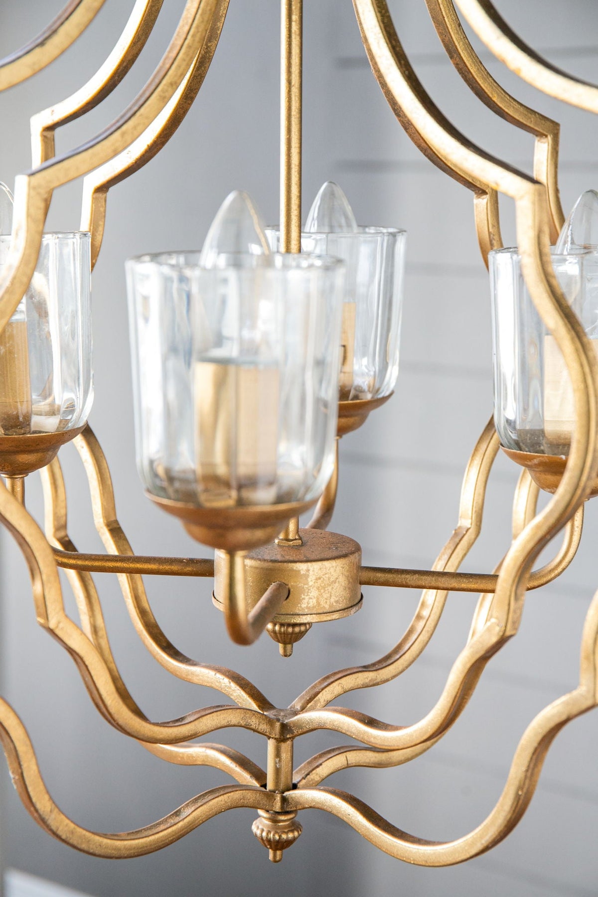 4-light gold metal chandelier with curved arms and glass cups by HouseOfZazla on Tampa Home & Garden Store