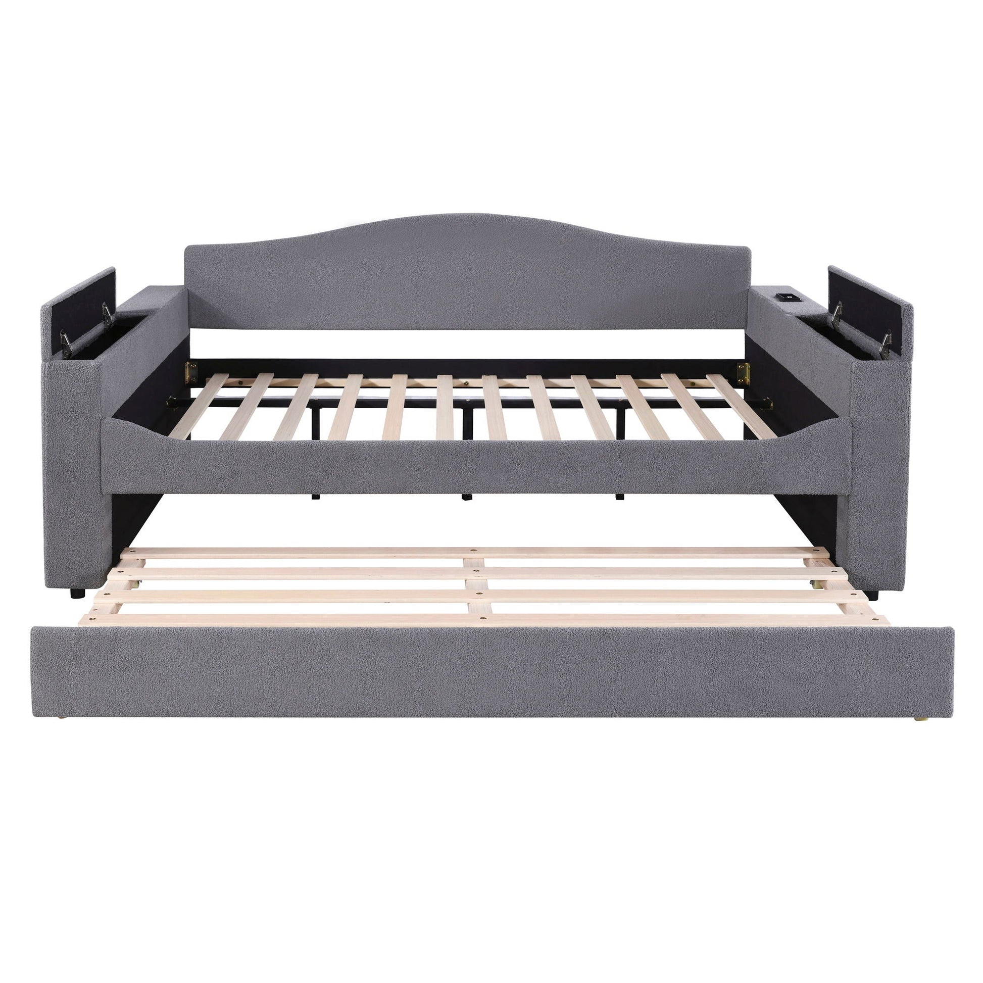 Grey upholstered daybed with curved headboard, side storage armrests and a pull-out trundle on Tampa Home & Garden Store