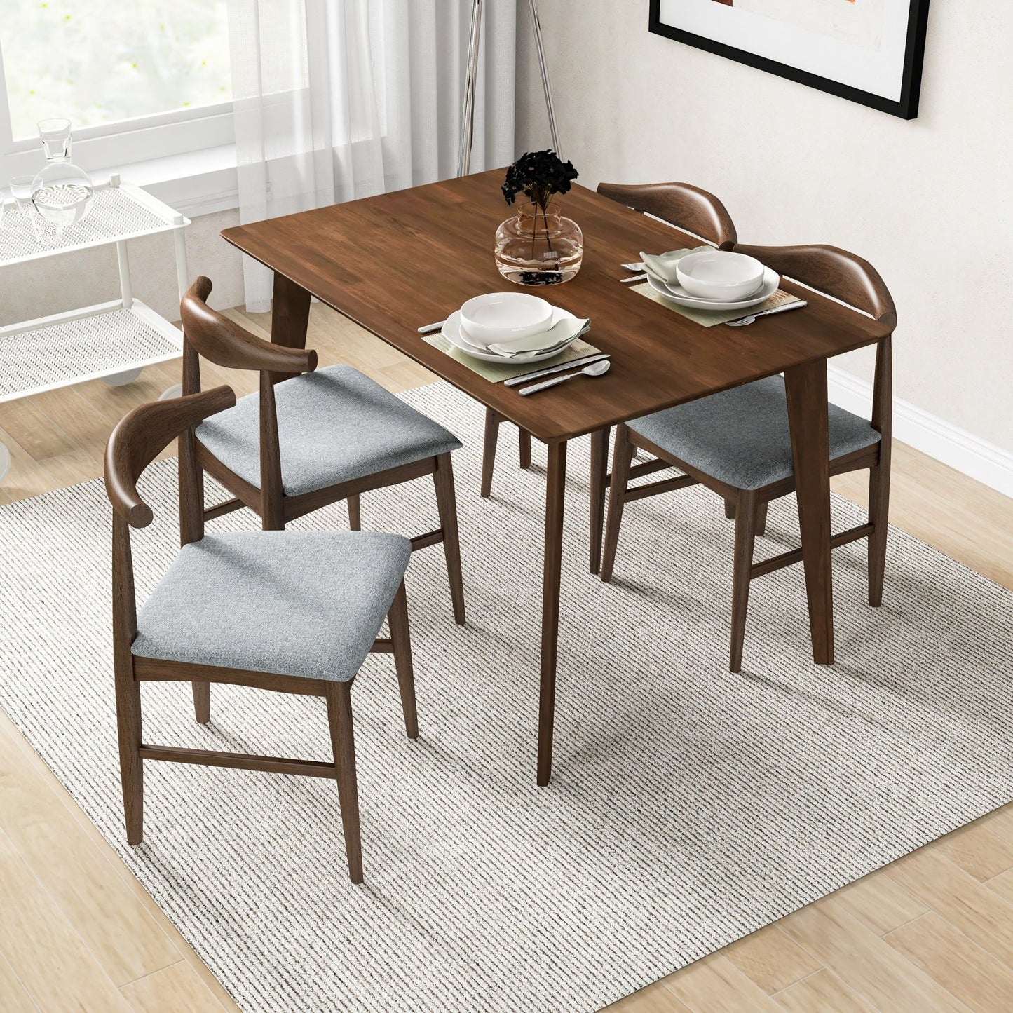 Levi modern rectangular dining table with four wooden chairs and a glass vase centerpiece on Tampa Home & Garden Store