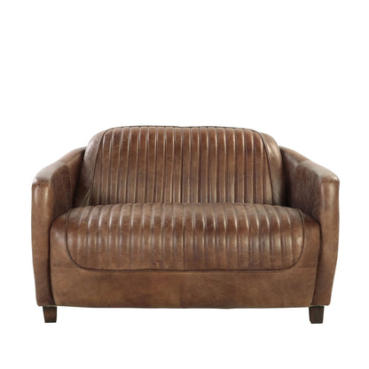 Grain leather stationary loveseat in brown with vertical channel stitching on Tampa Home & Garden Store