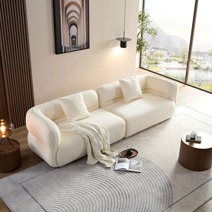 Sectional sofa in cream textured fabric with curved arms on Tampa Home & Garden Store