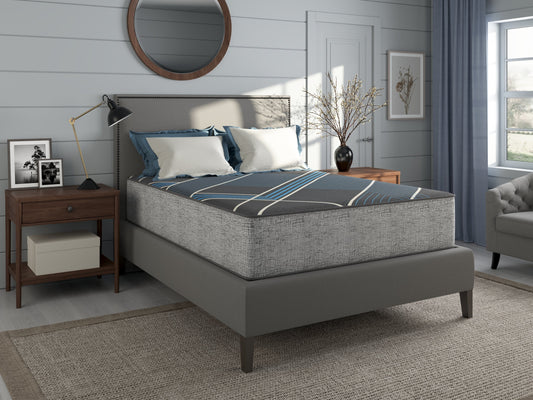 Tempagel by Restonic 13-in plush smooth-top mattress on grey upholstered bed on Tampa Home & Garden Store