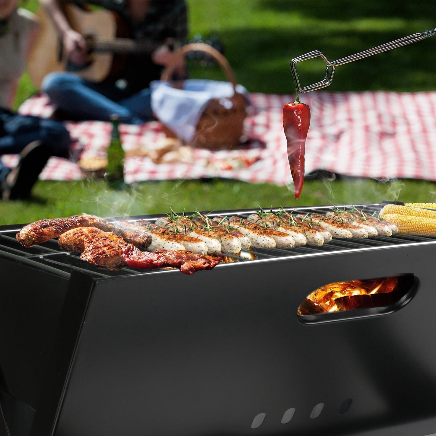 GemGear portable foldable charcoal grill in black with sausages and corn on Tampa Home & Garden Store