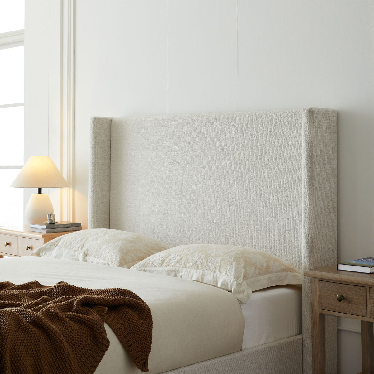 Hosford upholstered wingback bed with wood base in beige fabric HouseOfZazla on Tampa Home & Garden Store