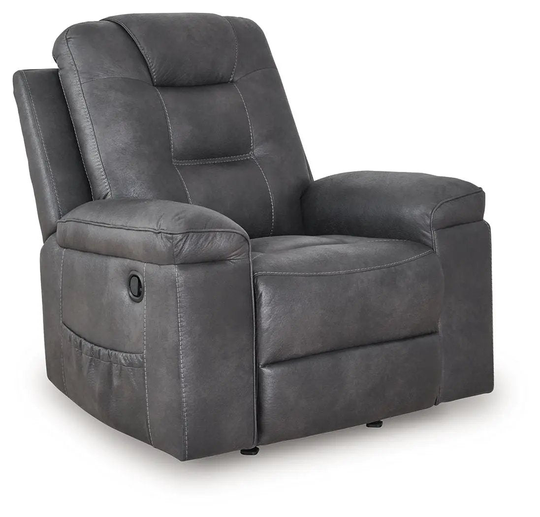 Stockworth Rocker Recliner in dark gray faux leather with plush cushions on Tampa Home & Garden Store