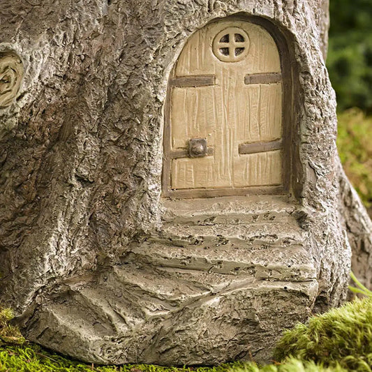 Resin tree trunk garden ornament with beige arched door and steps on Tampa Home & Garden Store