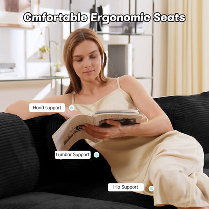 U-Shaped Modular Sofa in black breathable corduroy by HouseOfZazla with reading magazine on Tampa Home & Garden Store