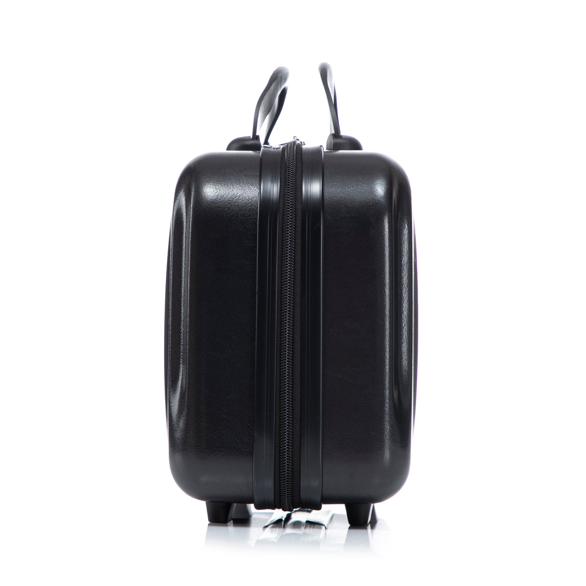 Black ABS hard-shell luggage with dual handles and center zipper, wheels visible on Tampa Home & Garden Store