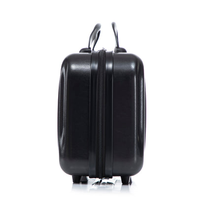 Black ABS hard-shell luggage with dual handles and center zipper, wheels visible on Tampa Home & Garden Store