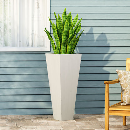 Outdoor modern cast stone planter with a light gray square pot housing a tall green snake plant on Tampa Home & Garden Store