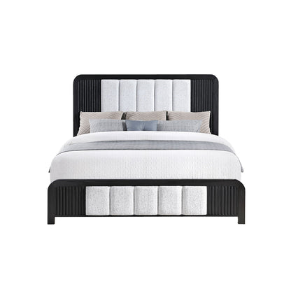 Beverly bed with fluted detailing, black panel bed frame with light gray upholstered headboard panels and neutral bedding on Tampa Home & Garden Store