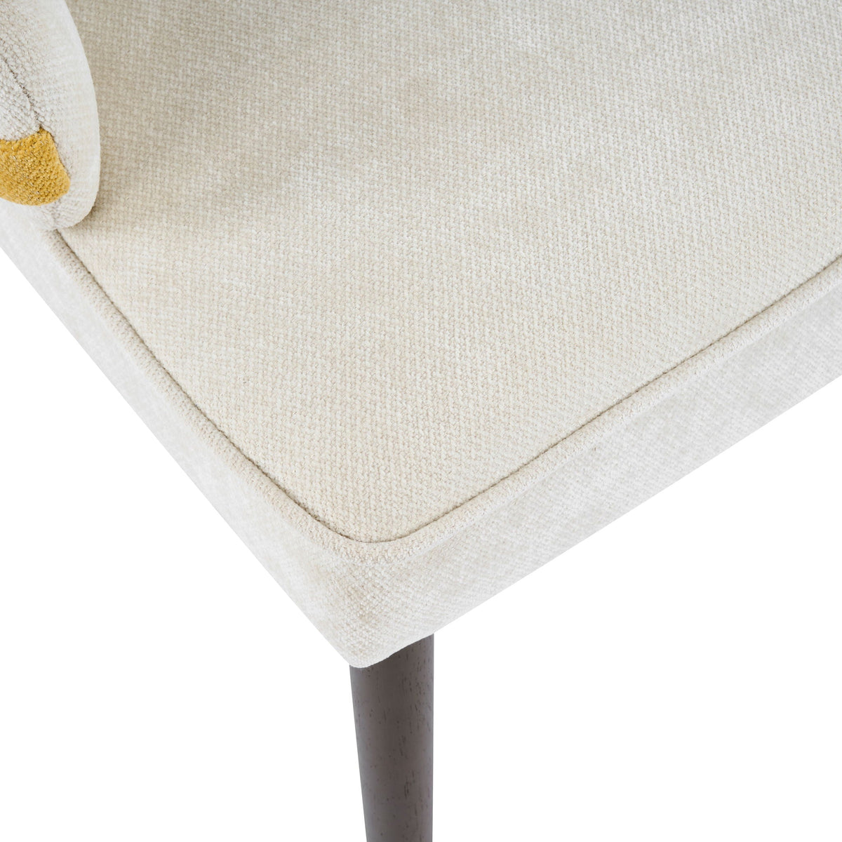 Indoor dining chair beige textured fabric with yellow accent trim; sturdy leg visible on Tampa Home & Garden Store