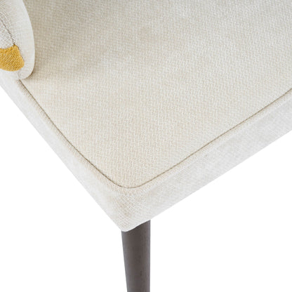 Indoor dining chair beige textured fabric with yellow accent trim; sturdy leg visible on Tampa Home & Garden Store