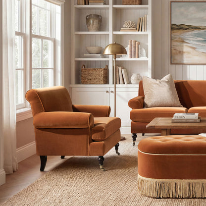 Accent Arm Chairs with Casters in rust-orange upholstery, living room scene with ottoman on Tampa Home & Garden Store