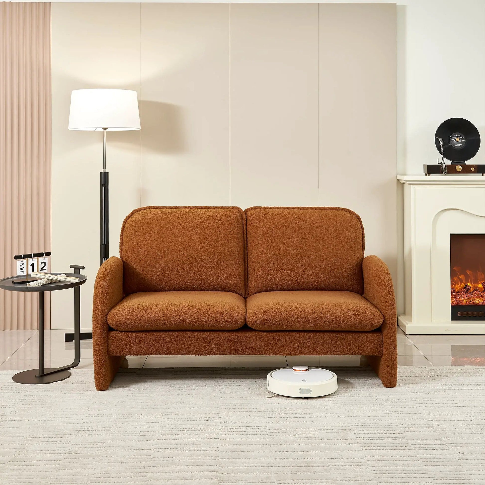 Loveseat sofa in warm brown sherpa upholstery in a living room with floor lamp on Tampa Home & Garden Store