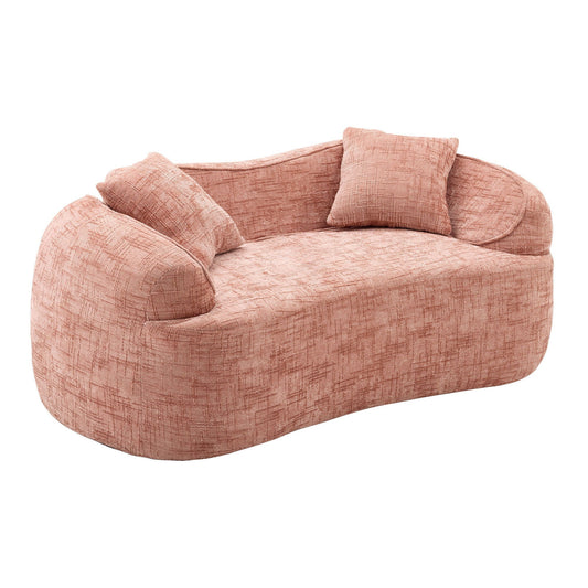 Curved 2-person stationary sofa in peach textured fabric with armrests and pillows on Tampa Home & Garden Store