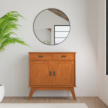 Draper entryway storage cabinet in brown wood with mid-century legs and round mirror on Tampa Home & Garden Store