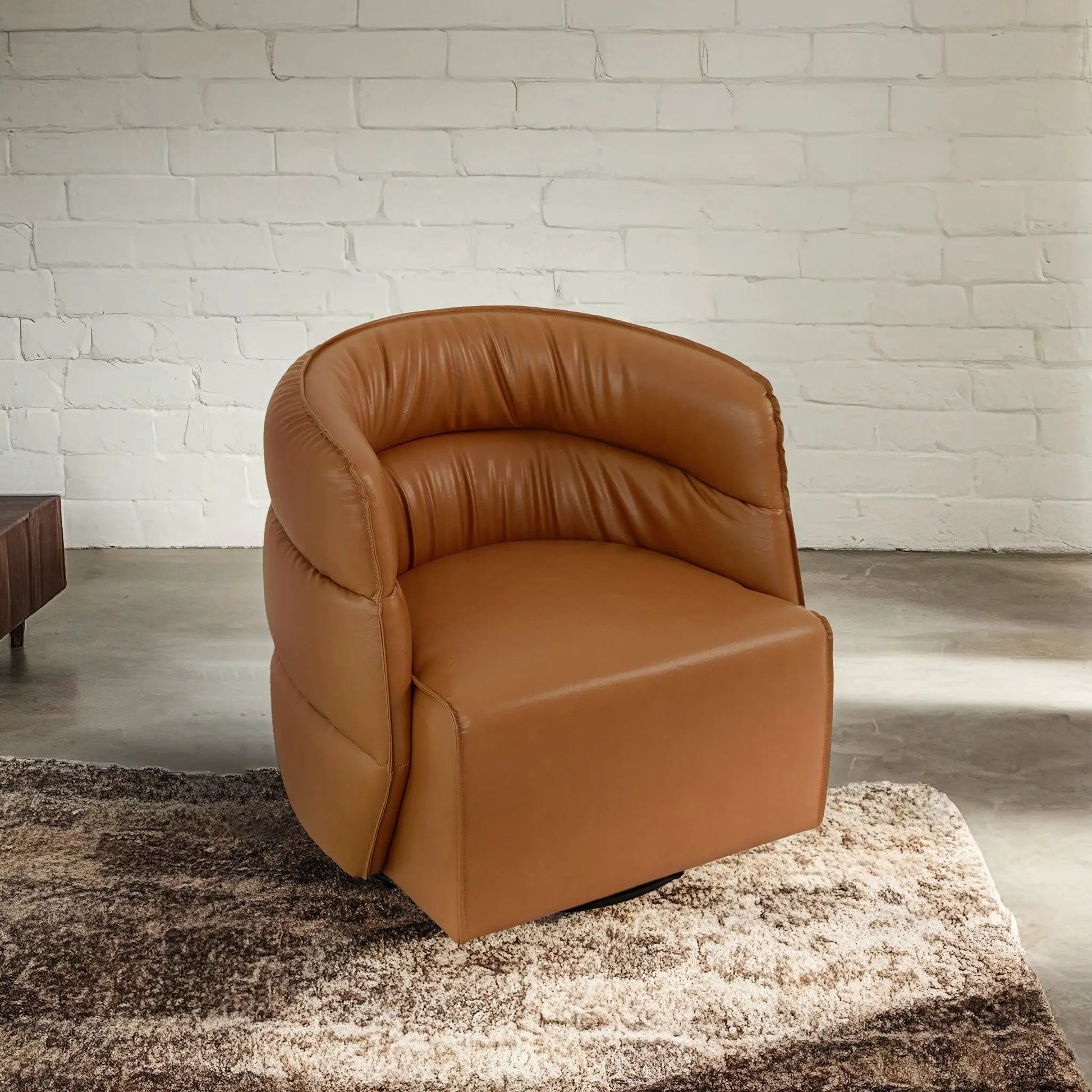 Walden Stylish Swivel Chair, tan leather upholstery with curved back and plush cushion on Tampa Home & Garden Store