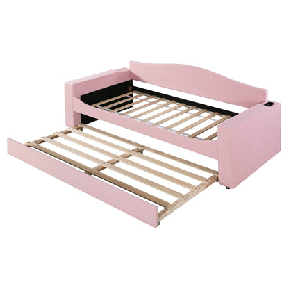 Pink upholstered daybed frame with curved backrest and wooden slat base, trundle-ready on Tampa Home & Garden Store