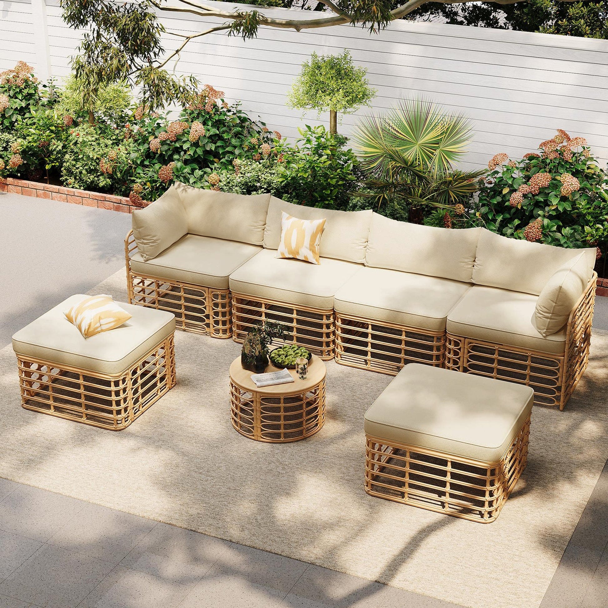 7-piece all-weather rattan outdoor furniture set with thick beige cushions and pillows on Tampa Home & Garden Store