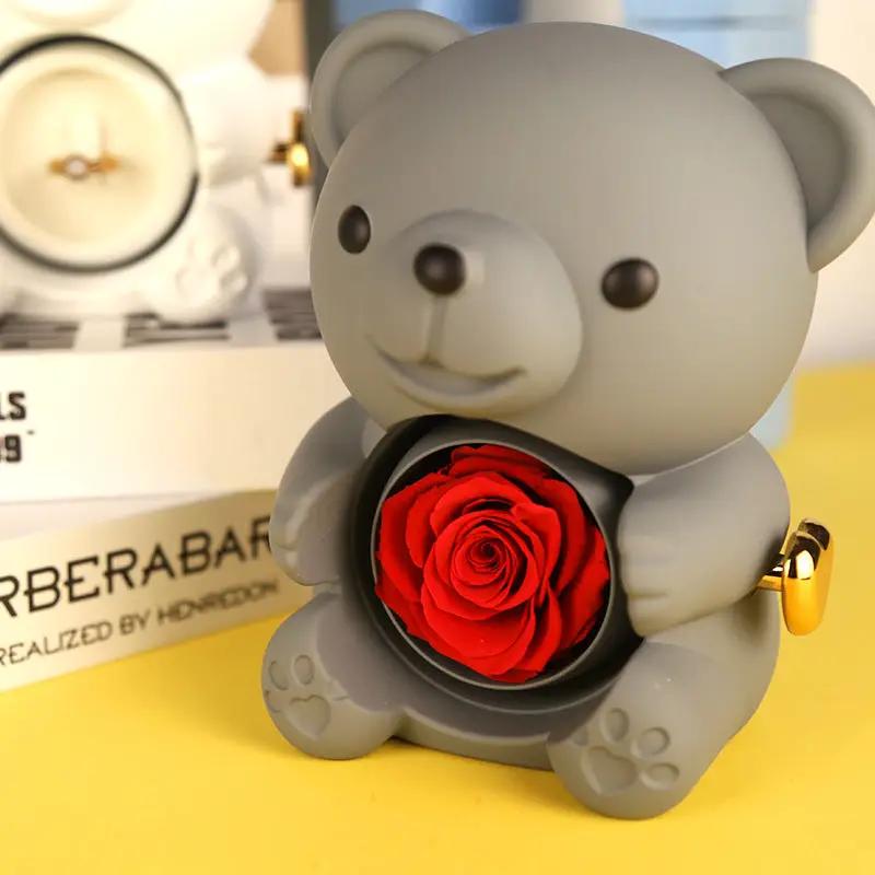 Gray teddy bear jewelry box with a red rose in its chest and a gold latch on the side on Tampa Home & Garden Store