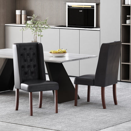 Four tufted dining chairs with high backs in black leather around a marble table on Tampa Home & Garden Store