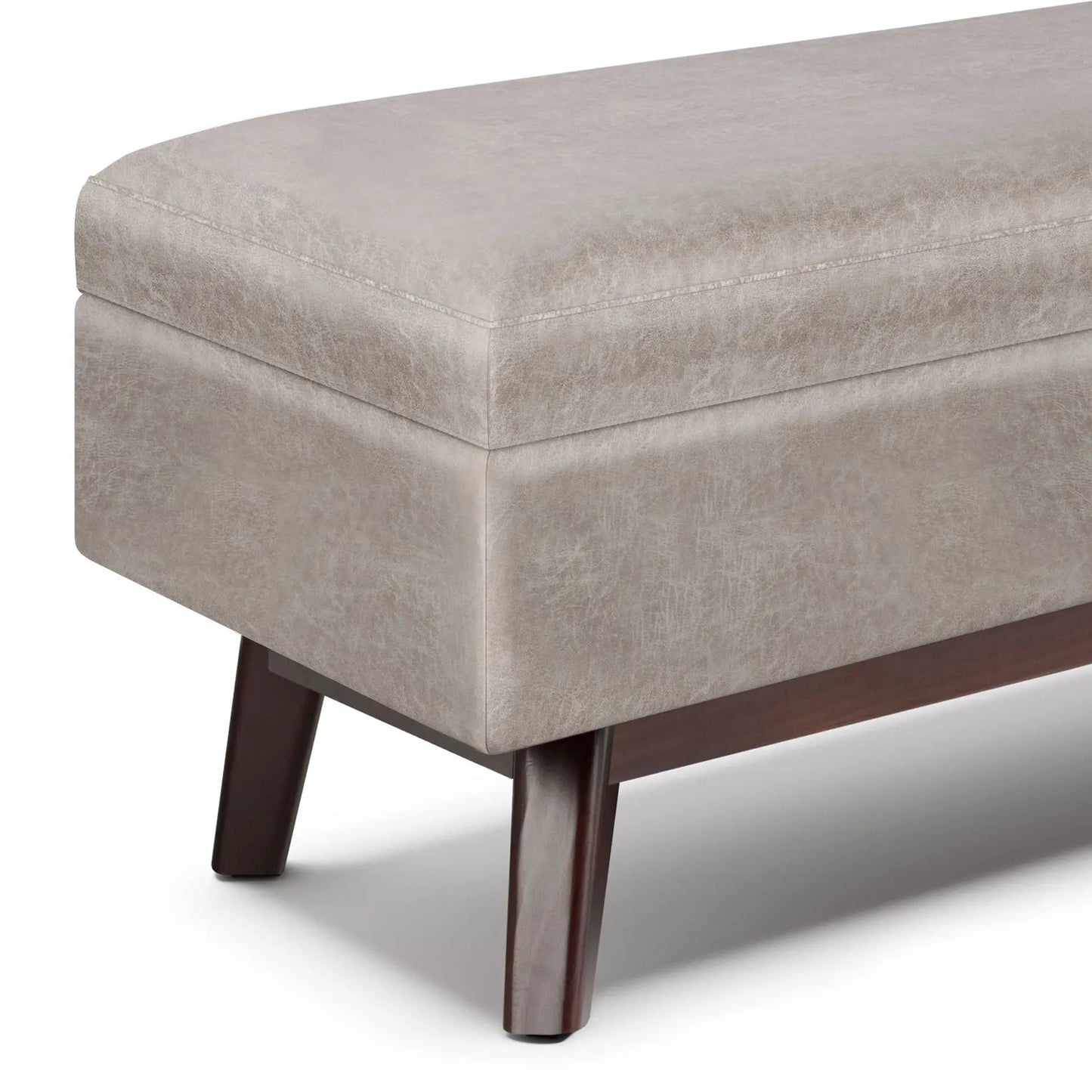 Owen upholstered rectangular storage ottoman in beige faux leather with dark wood legs on Tampa Home & Garden Store