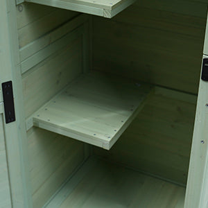 Outdoor Wooden Storage Shed by HouseOfZazla, light-green interior with built-in shelves on Tampa Home & Garden Store