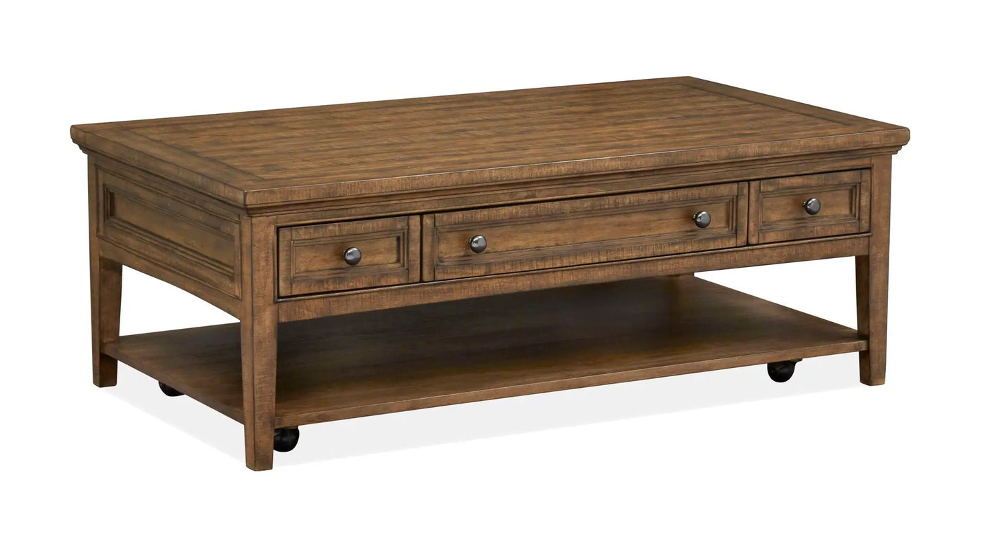 Bay Creek rectangular end table in warm brown wood finish with three drawers and a lower shelf on Tampa Home & Garden Store