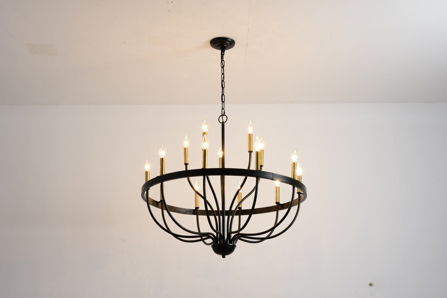 18-light industrial iron chandelier with black metal frame and gold candle holders, chain suspended on Tampa Home & Garden Store