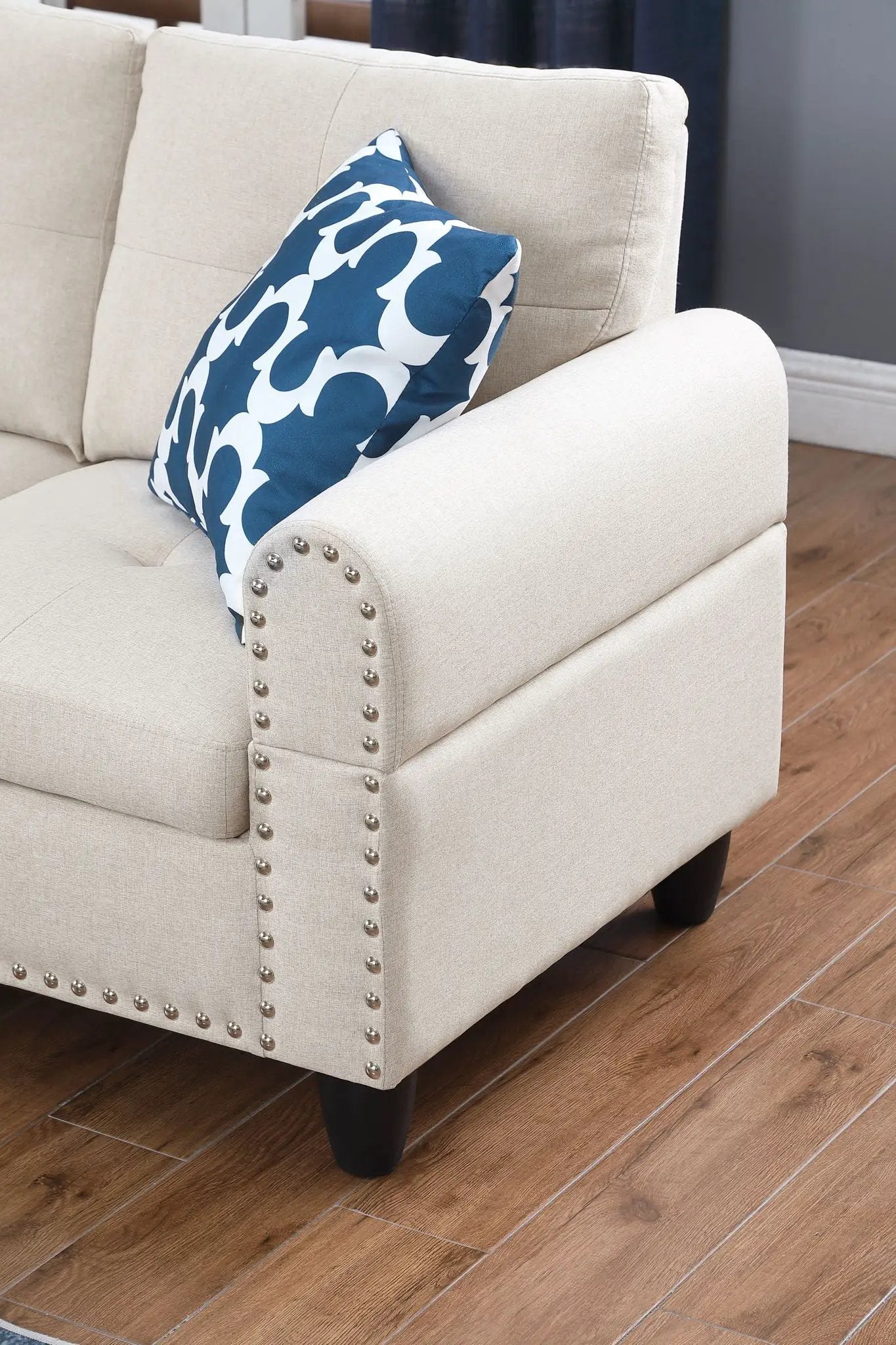 Alger beige left-hand facing sofa arm with nailhead trim and blue patterned cushion on Tampa Home & Garden Store