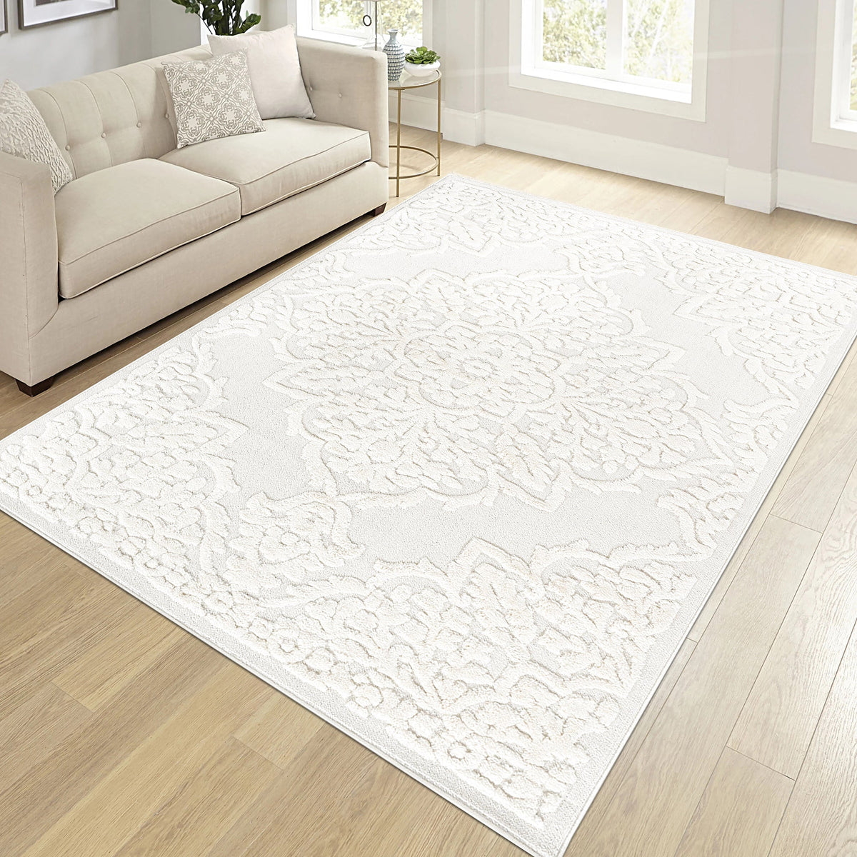Cream medallion area rug with high-low pile, 6'7 x 9', beige textured pattern on Tampa Home & Garden Store