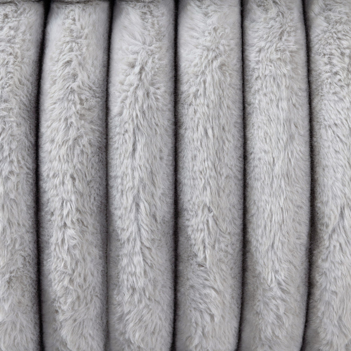 Bruni sectional sofa gray fur upholstery close-up with plush texture on Tampa Home & Garden Store