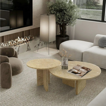 Elegant Coffee Duo Table Set round stone tables with tapered legs in a modern living room on Tampa Home & Garden Store