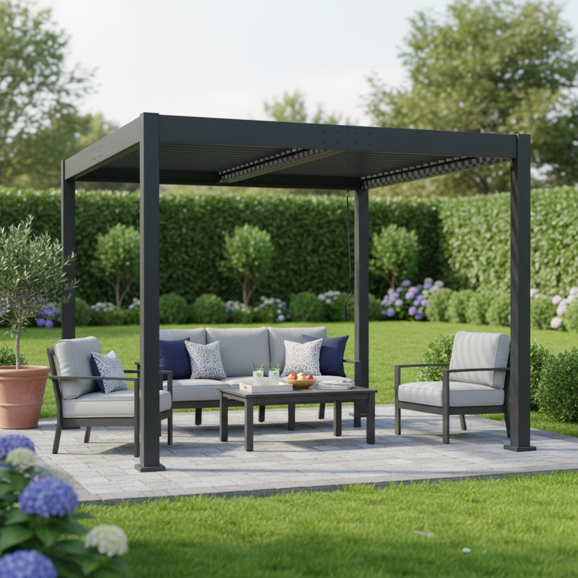 Byron Outdoor Pergola, dark gray metal frame with gray outdoor sofa set and blue cushions on Tampa Home & Garden Store