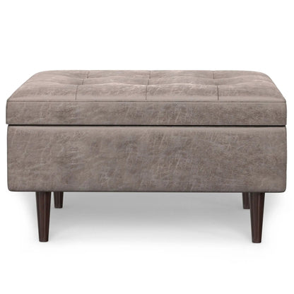 Shay large square storage ottoman with tufted taupe upholstery and dark tapered wood legs on Tampa Home & Garden Store