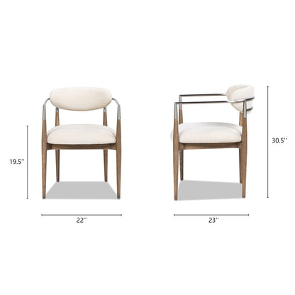 Artemis upholstered dining armchairs with brushed nickel arms in warm white, set on Tampa Home & Garden Store