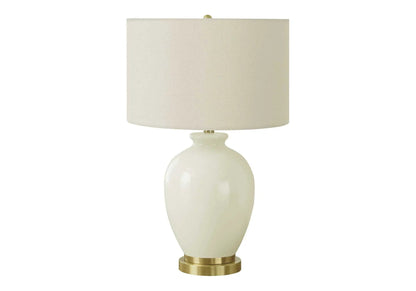 Table lamp cream shade with glossy white ceramic base and brass accents on Tampa Home & Garden Store