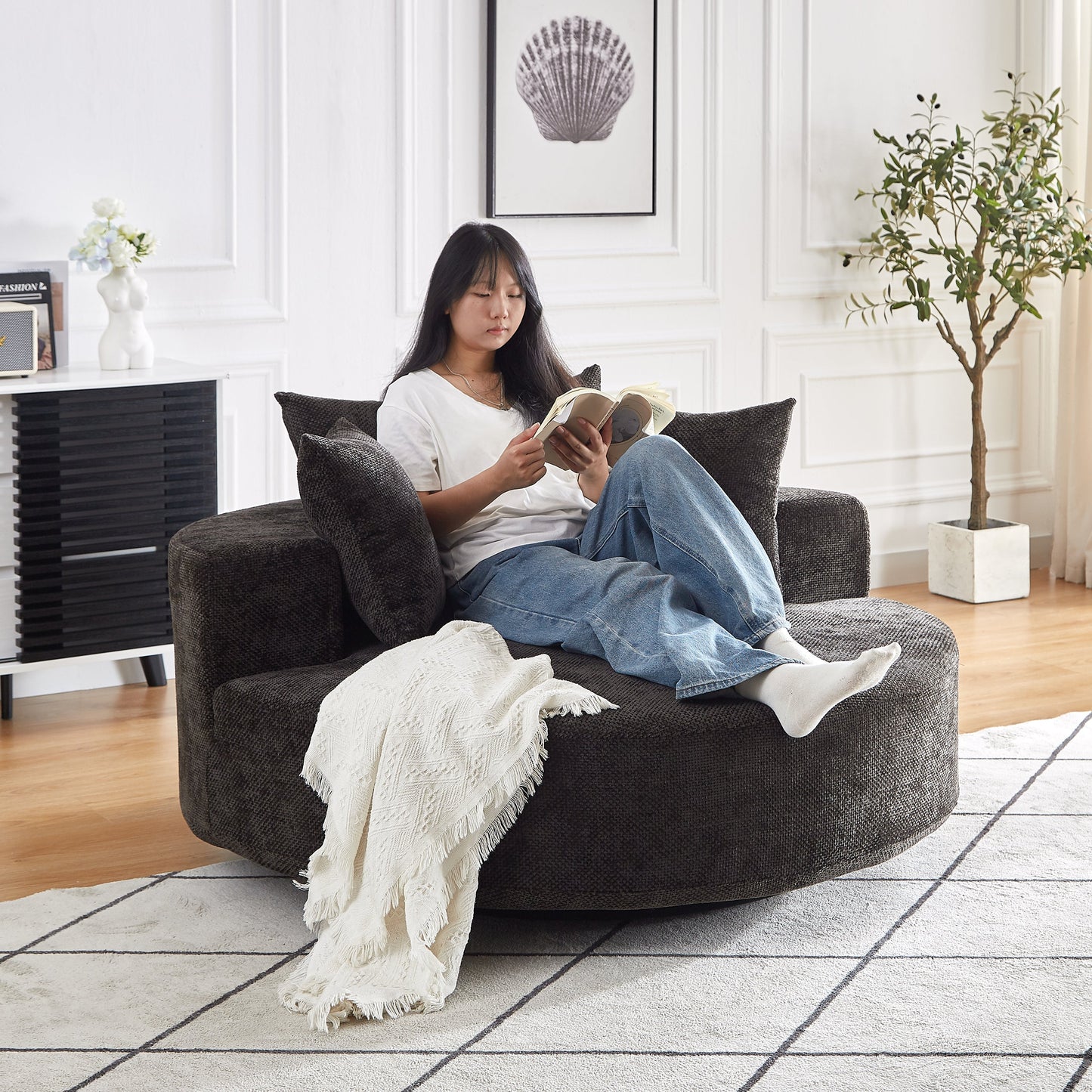 55'' Chenille Foam Single Swivel Chair dark charcoal chenille; person reading on it on Tampa Home & Garden Store