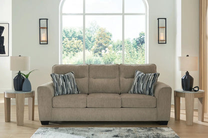 Olten beige stationary sofa with striped cushions and lamps on Tampa Home & Garden Store
