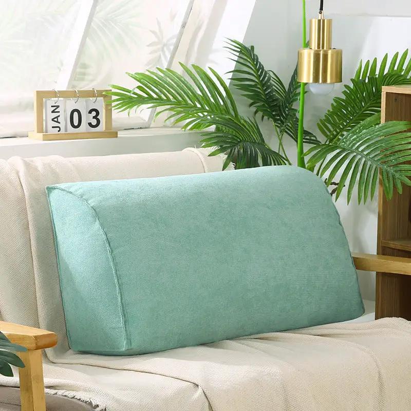 Removable washable sofa cushion, teal fabric, on beige living room sofa with greenery on Tampa Home & Garden Store